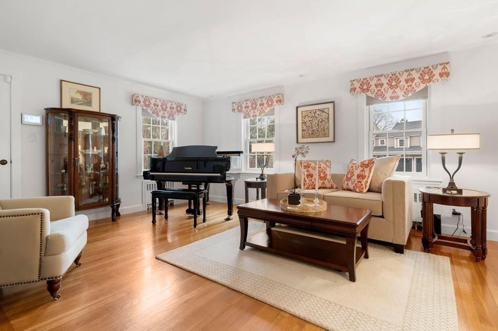 2 Lexington Avenue Lexington, MA 02421 - Photo 13 of 39 a living room with furniture and wooden floor