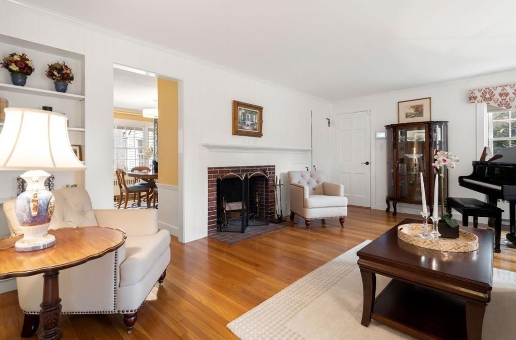 2 Lexington Avenue Lexington, MA 02421 - Photo 14 of 39 a living room with furniture and a fireplace