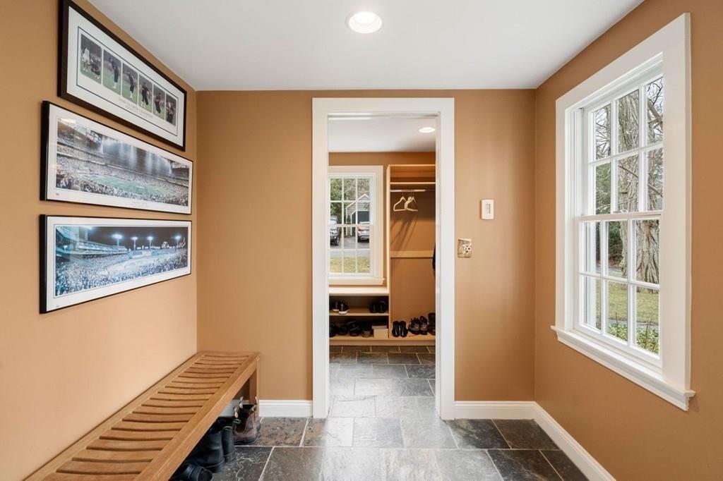 2 Lexington Avenue Lexington, MA 02421 - Photo 16 of 39 a view of an empty room with wooden floor and a window
