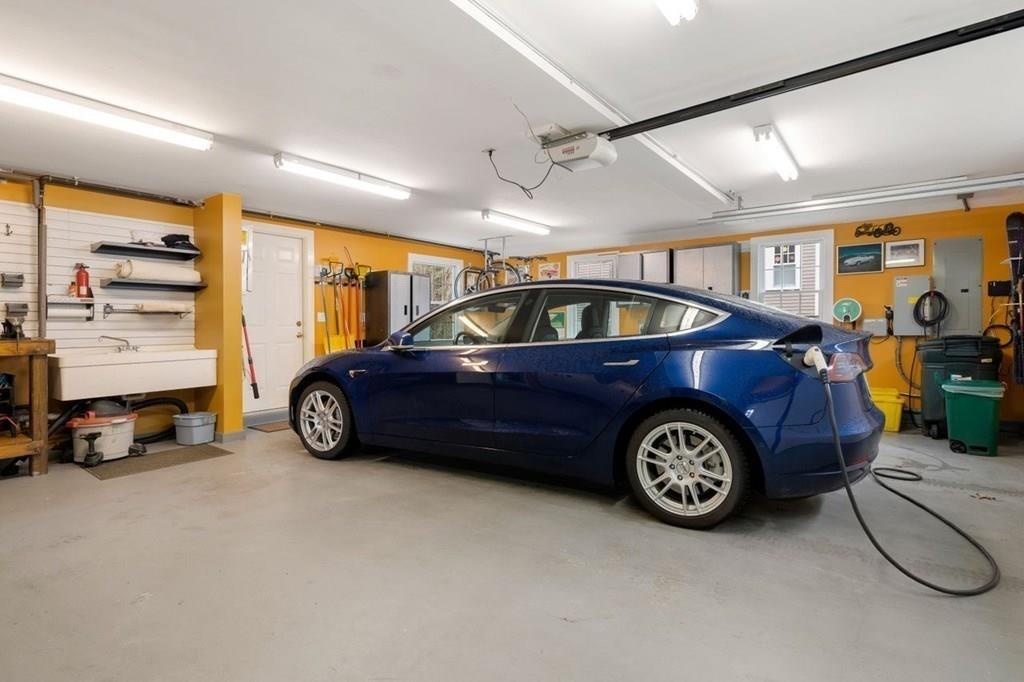 2 Lexington Avenue Lexington, MA 02421 - Photo 18 of 39 a view of a car in a garage