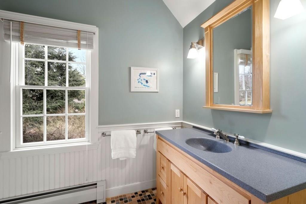 2 Lexington Avenue Lexington, MA 02421 - Photo 21 of 39 a bathroom with a sink and a window