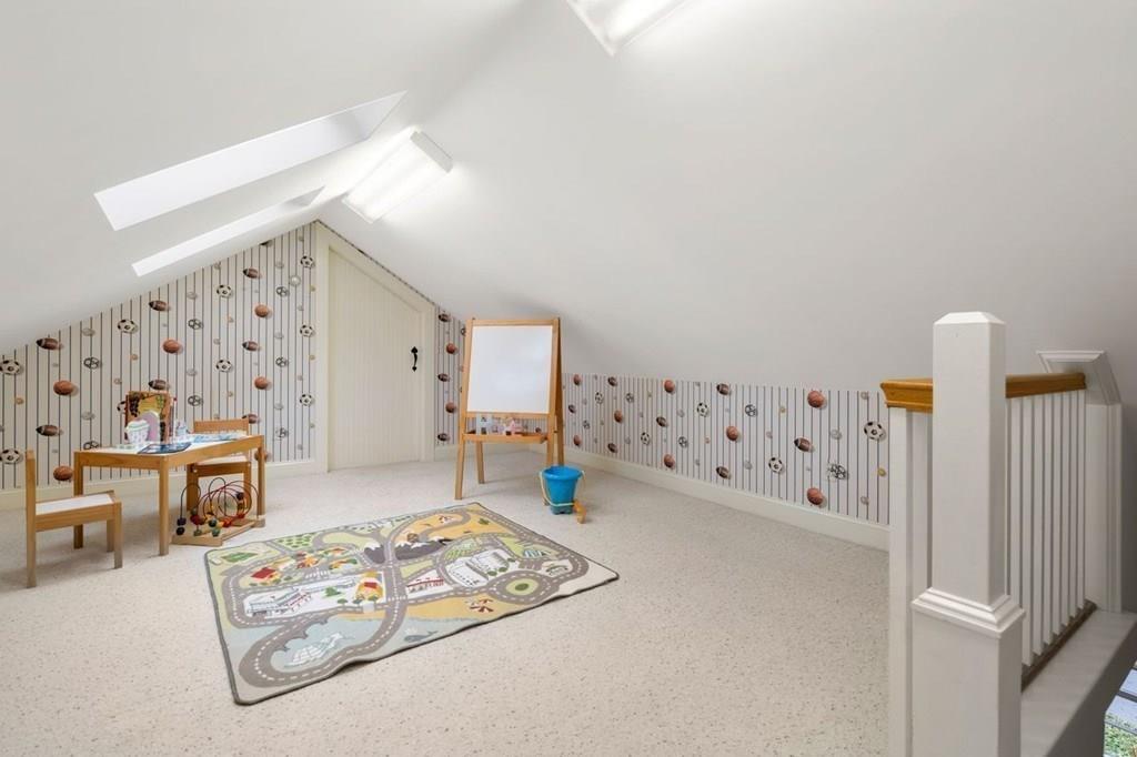 2 Lexington Avenue Lexington, MA 02421 - Photo 23 of 39 a living room with furniture