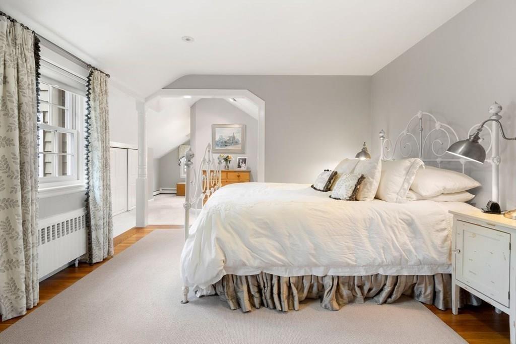 2 Lexington Avenue Lexington, MA 02421 - Photo 28 of 39 a bed room with a bed and a chair