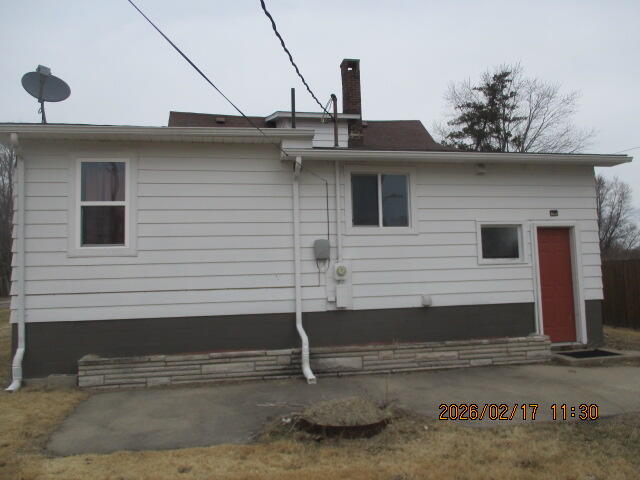 407 East State Street Morocco, IN 47963 - Photo 2 of 18 a front view of a house with a garage