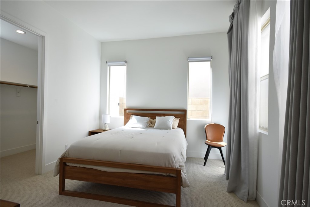 364 Baluster Irvine, CA 92618 - Photo 18 of 56 a bedroom with a bed and a window