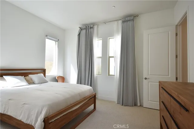 a bathroom with a toilet a sink and shower