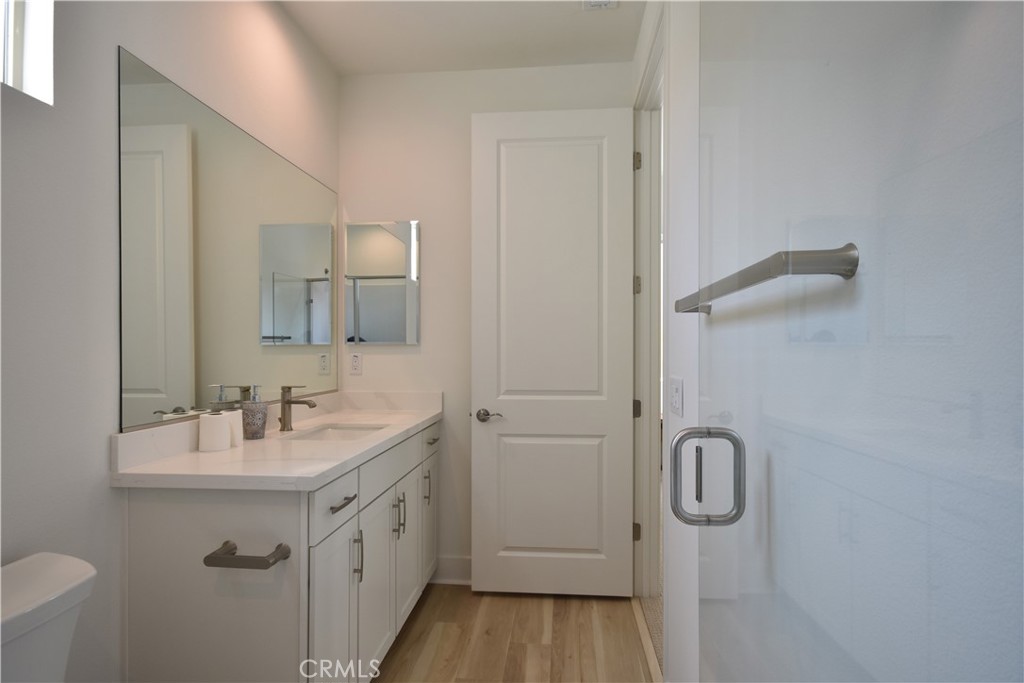 364 Baluster Irvine, CA 92618 - Photo 22 of 56 a spacious bathroom with a double vanity sink a mirror and shower