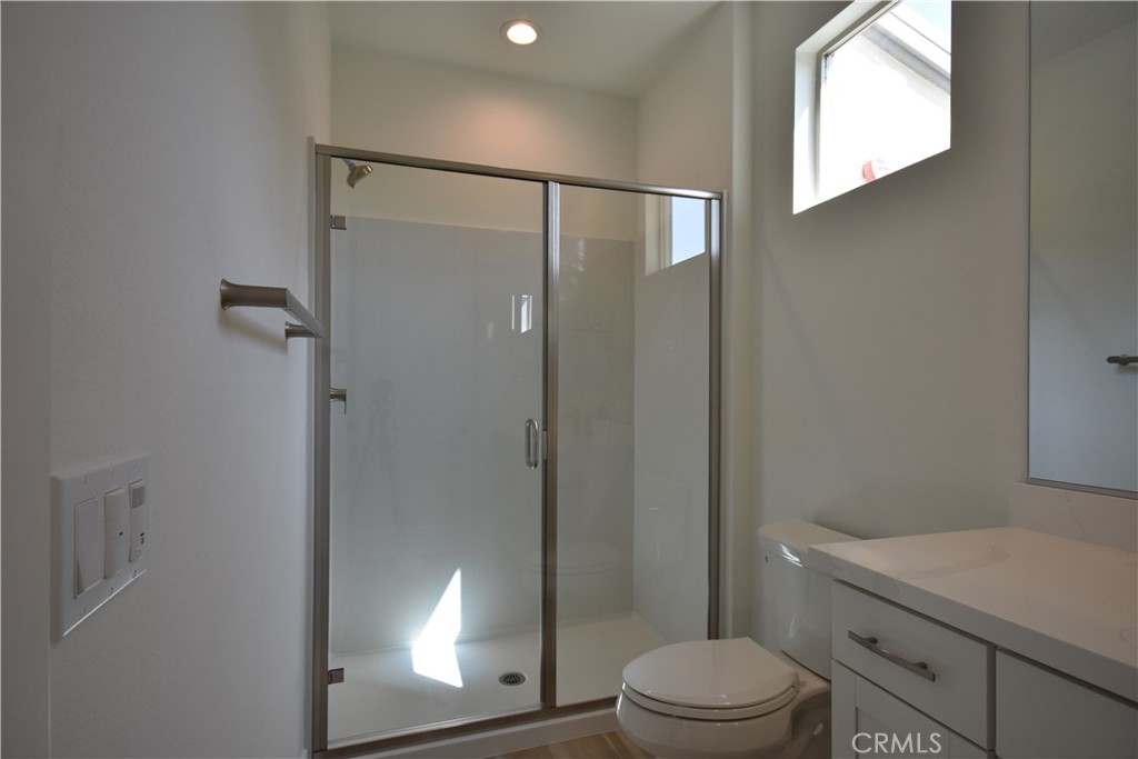 364 Baluster Irvine, CA 92618 - Photo 23 of 56 a bathroom with a toilet a sink and shower