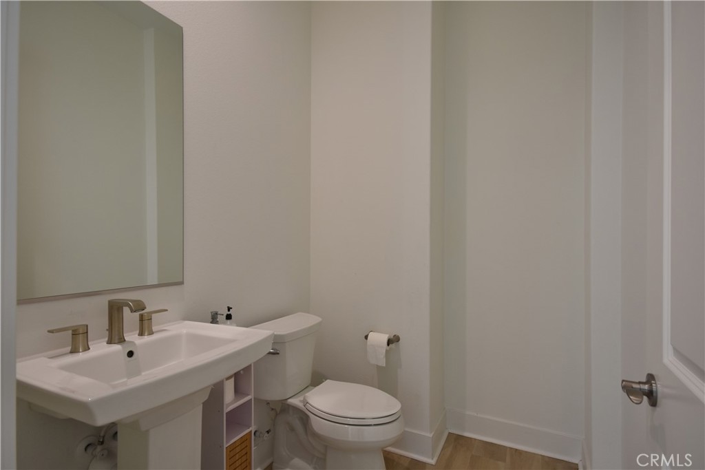 364 Baluster Irvine, CA 92618 - Photo 24 of 56 a bathroom with a sink and a toilet