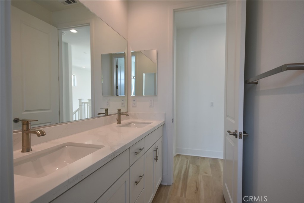 364 Baluster Irvine, CA 92618 - Photo 31 of 56 a bathroom with a sink and a mirror