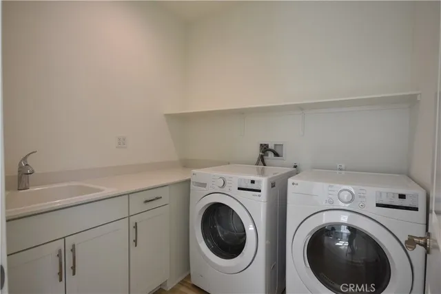 a workspace with wooden floor and a window