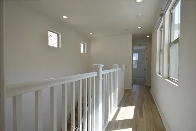 a bedroom with a bed and a table