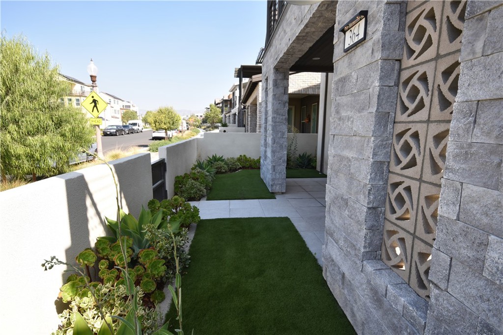 364 Baluster Irvine, CA 92618 - Photo 4 of 56 a view of a pathway both side of building