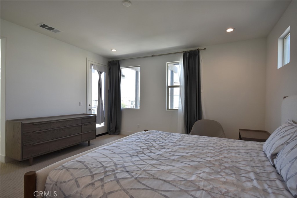 364 Baluster Irvine, CA 92618 - Photo 42 of 56 a bedroom with a bed and a window