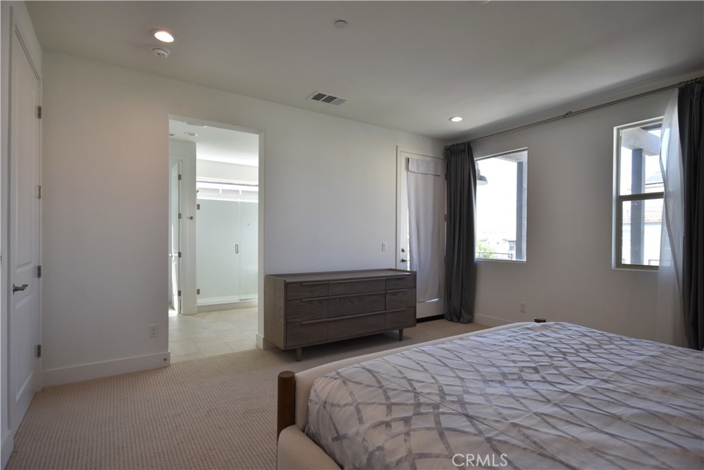 364 Baluster Irvine, CA 92618 - Photo 43 of 56 a bedroom with a bed and a window