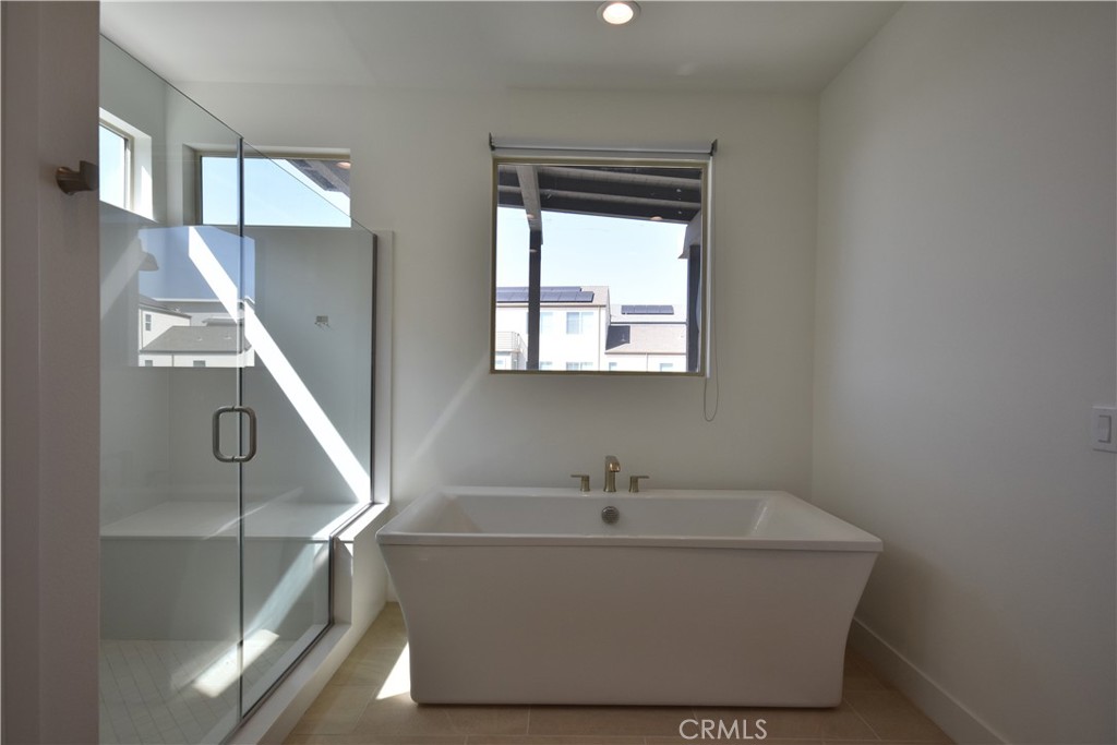 364 Baluster Irvine, CA 92618 - Photo 52 of 56 a white bath tub sitting in a bathroom
