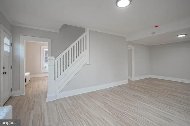 a view of entryway with wooden floor