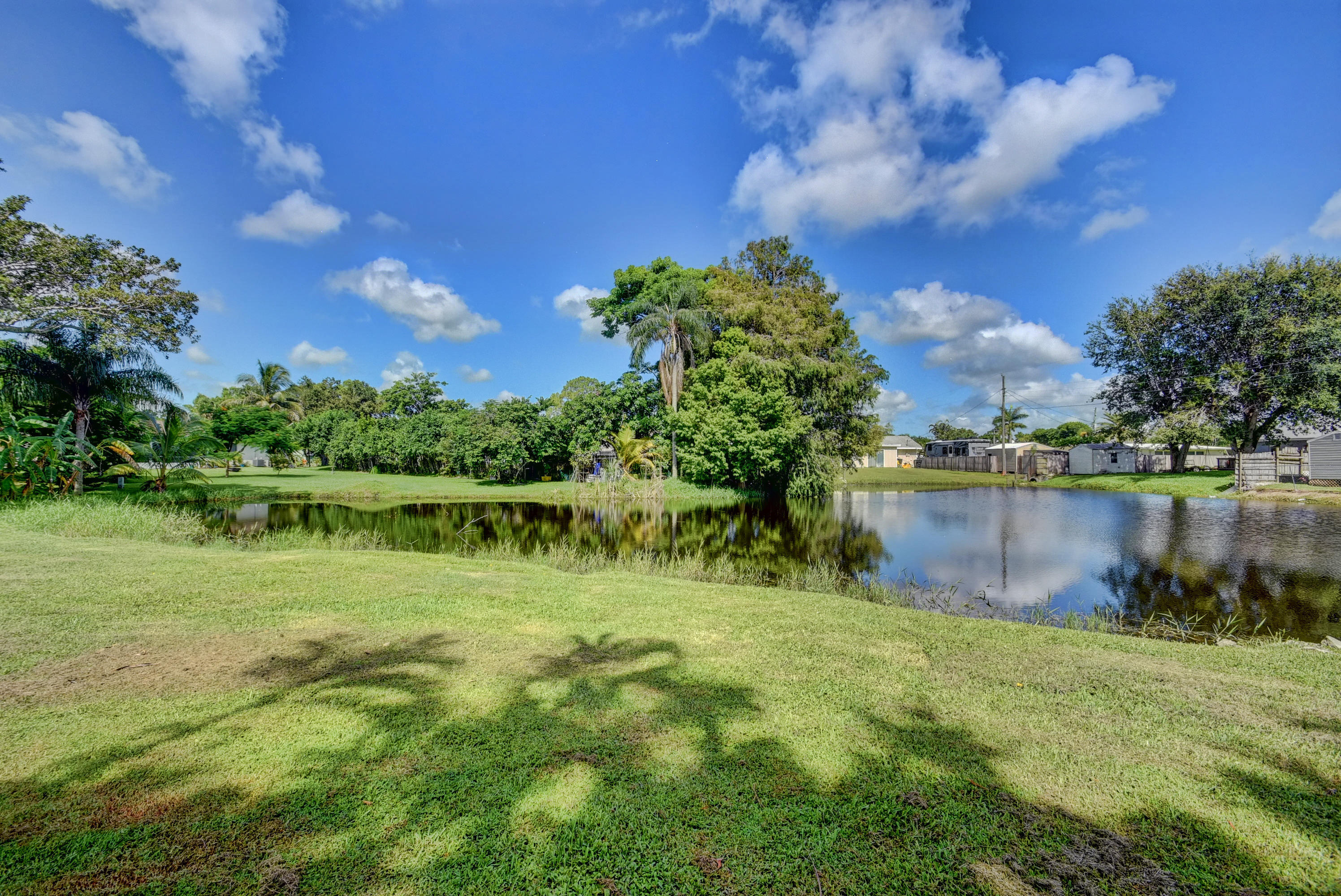 46 Cleveland Road Lake Worth, FL 33467 - Photo 32 of 40 Pond in Backyard