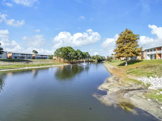 a view of a lake with a house