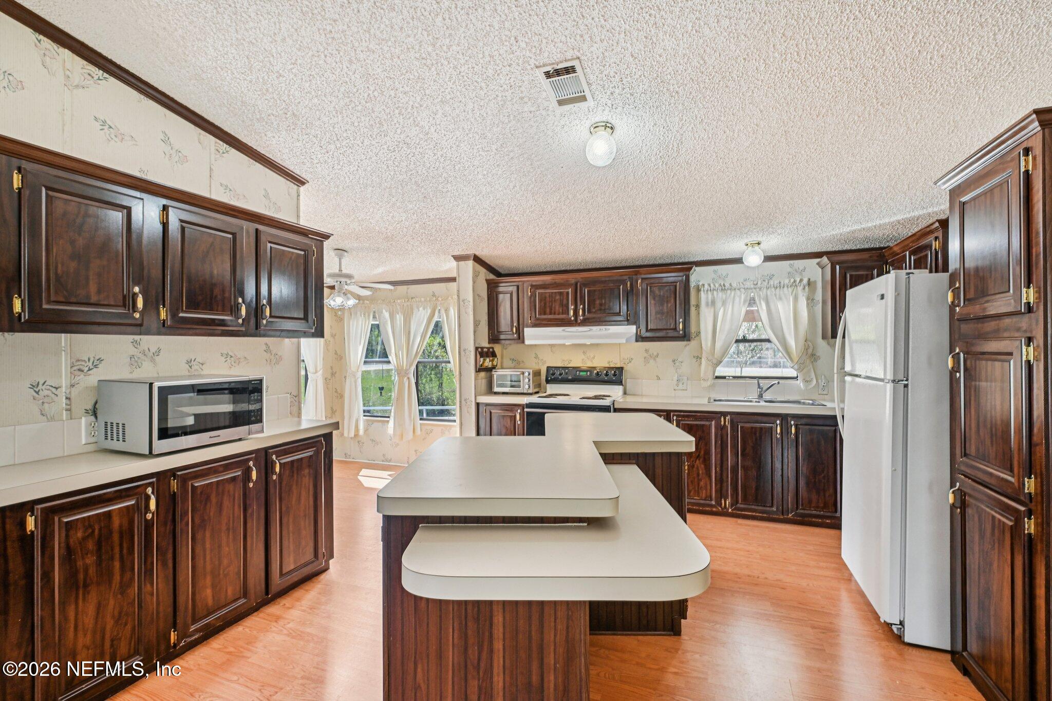 128 Sesame Street Middleburg, FL 32068 - Photo 25 of 66 Large Kitchen with Island