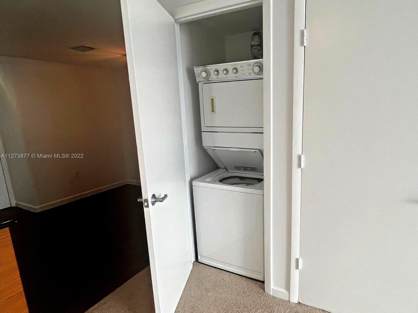 50 Biscayne Boulevard, Unit 5005 Miami, FL 33132 - Photo 12 of 20 a utility room with dryer and washer