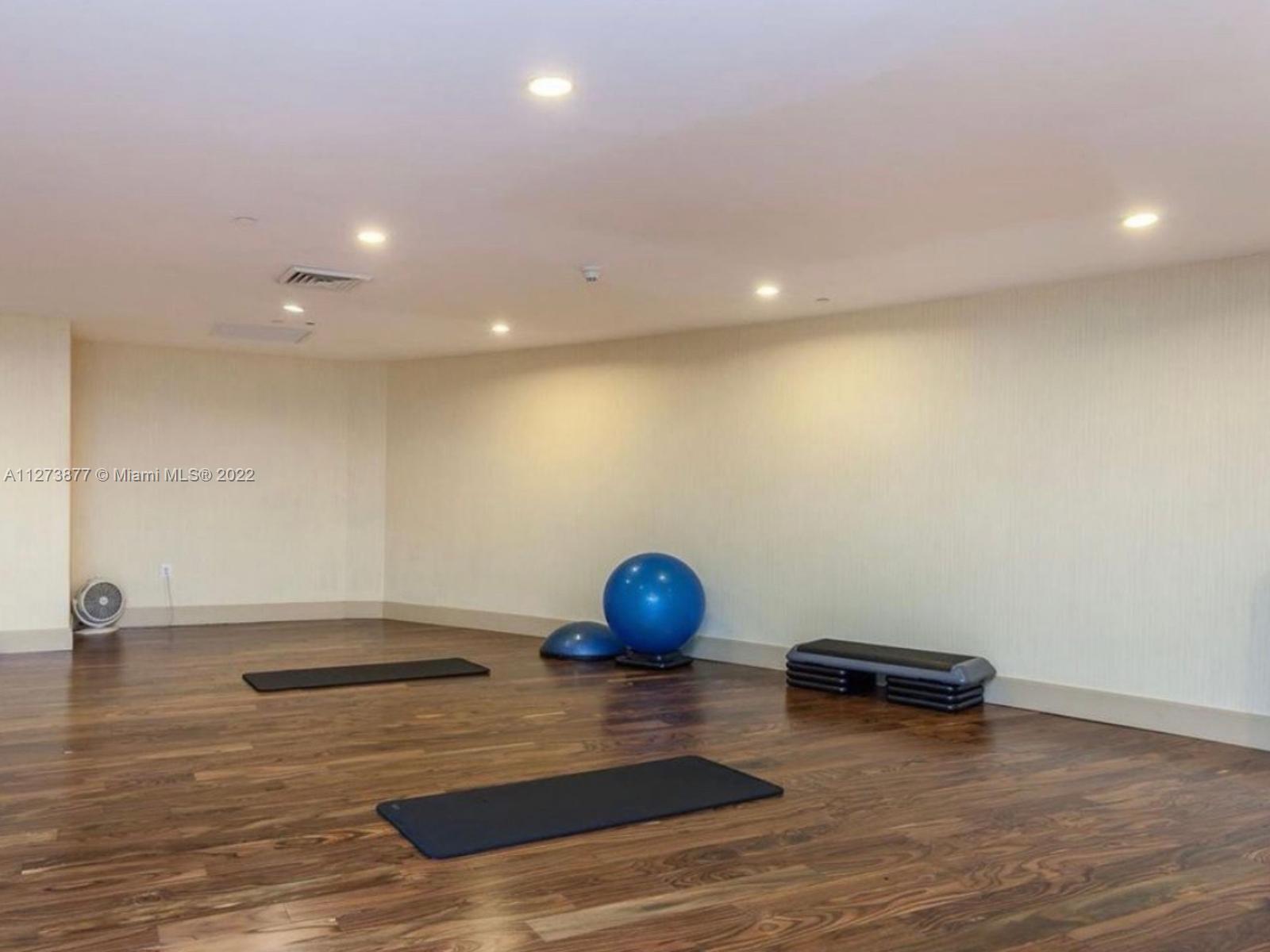50 Biscayne Boulevard, Unit 5005 Miami, FL 33132 - Photo 18 of 20 a view of a room with wooden floor