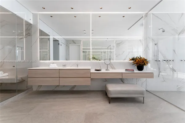 a bathroom with a bathtub and a sink