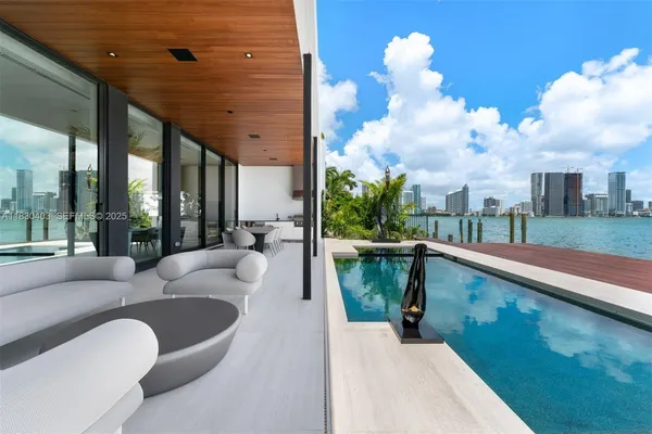 a view of balcony with couch and outdoor view