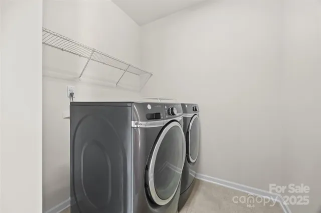 a view of a balcony with small garden