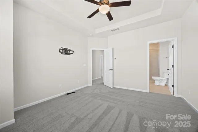 a bathroom with a granite countertop sink double and mirror