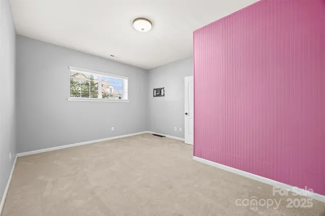 a car parked in front of a house