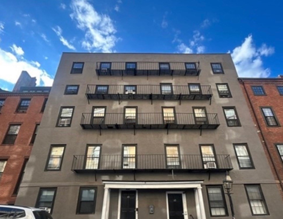 63 Hancock, Unit BR Boston, MA 02114 - Photo 12 of 12 a front view of a building