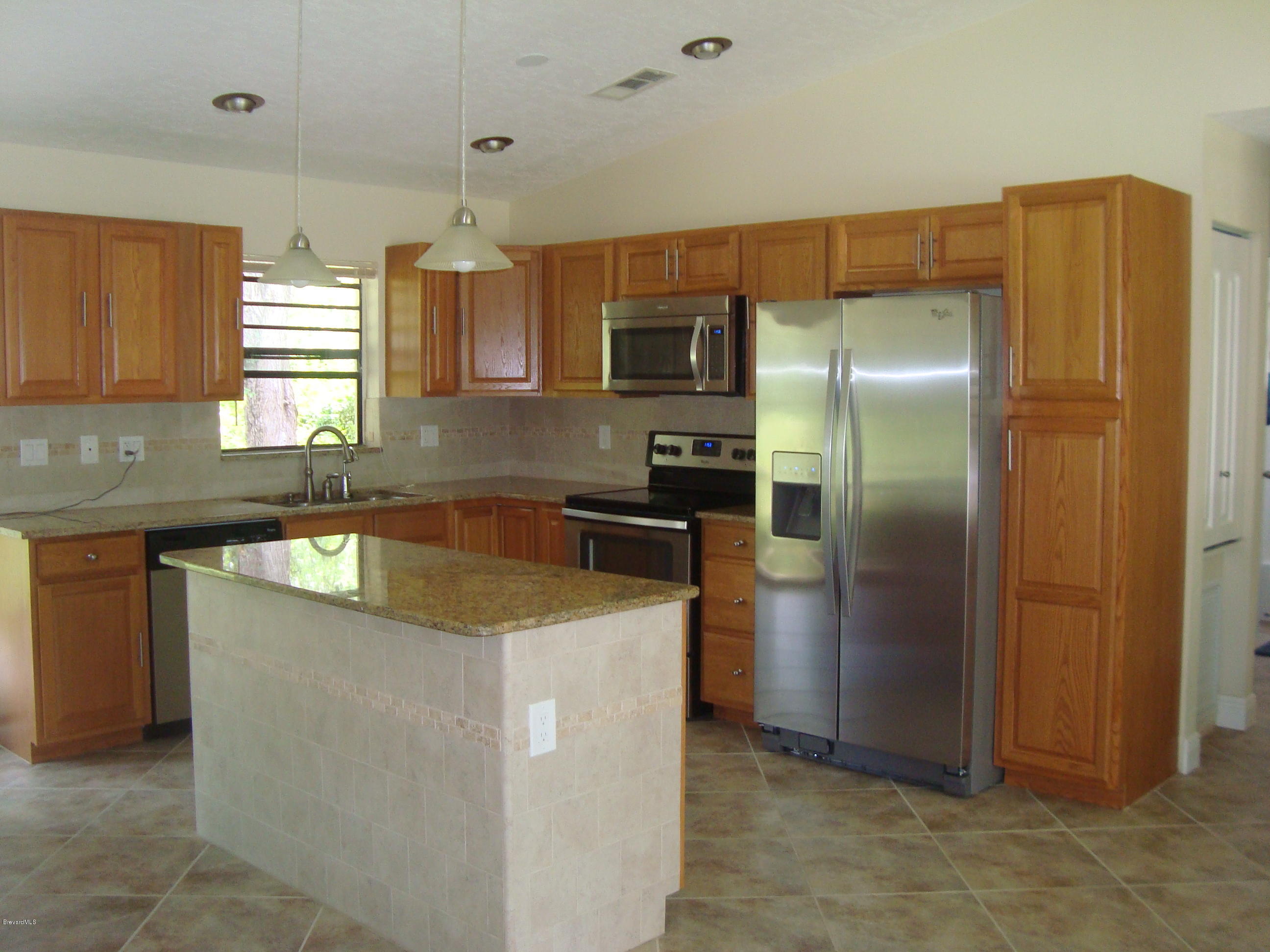 413 Wayland Road Southwest Palm Bay, FL 32908 - Photo 3 of 19 DSC05330