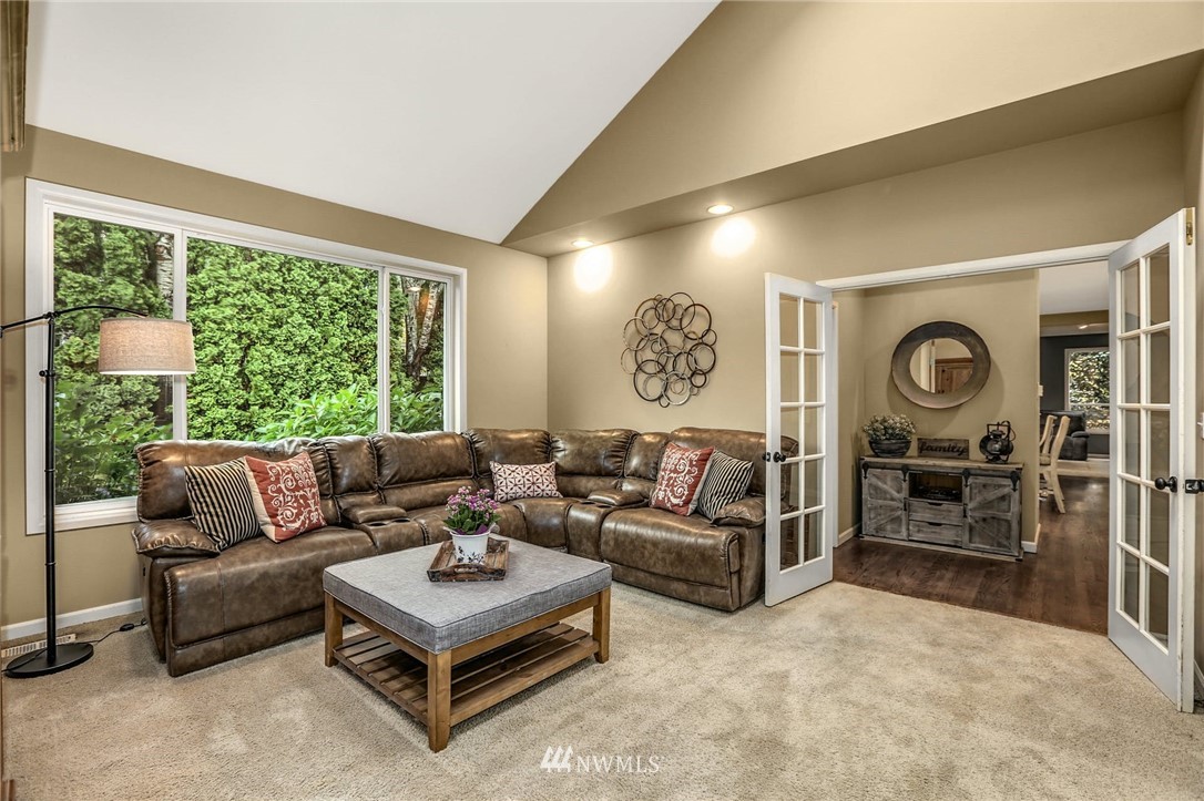 3933 208th Place Southeast Bothell, WA 98021 - Photo 14 of 40 a living room with furniture and a large window