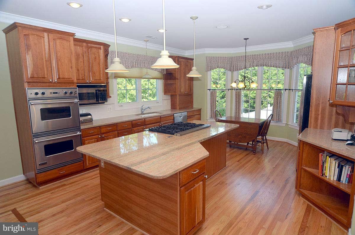 24719 Ridge Road Damascus, MD 20872 - Photo 13 of 30 Kitchen with center island