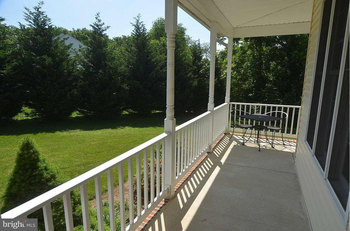 24719 Ridge Road Damascus, MD 20872 - Photo 24 of 30 upper level deck with view of back yard