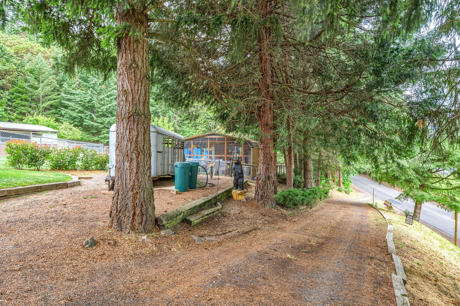 9250 Wagner Creek Road Talent, OR 97540 - Photo 45 of 52 Tree lined semi circular driveway, home is above road