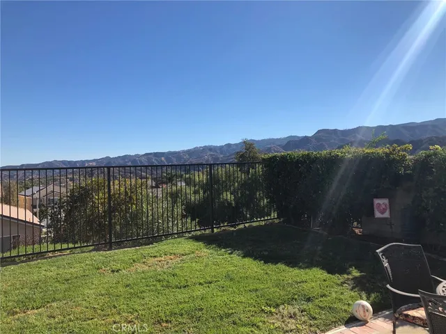 a view of a garden with a lake