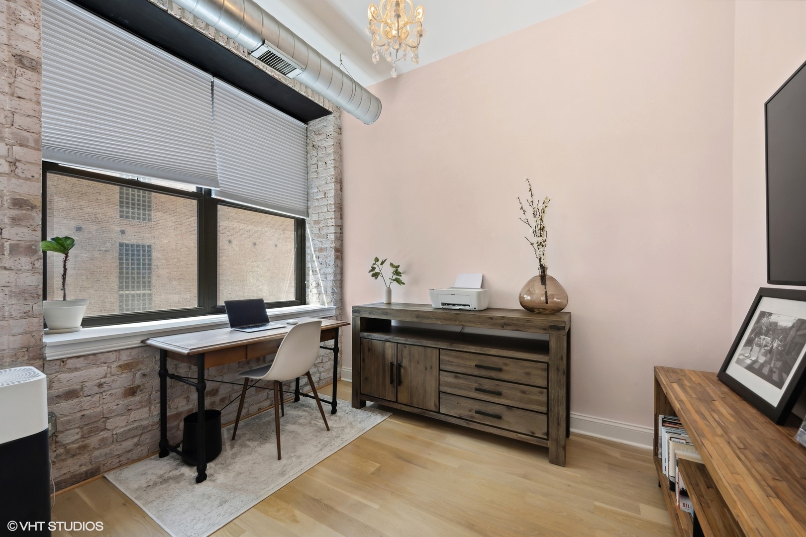 23 North Green Street, Unit 203 Chicago, IL 60607 - Photo 11 of 15 a view of a workspace with furniture