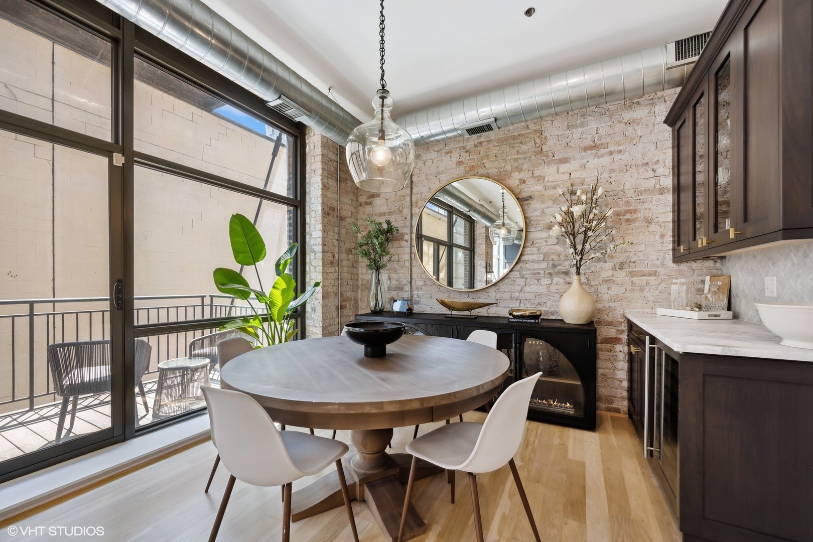 23 North Green Street, Unit 203 Chicago, IL 60607 - Photo 7 of 15 a dining room with furniture and a window