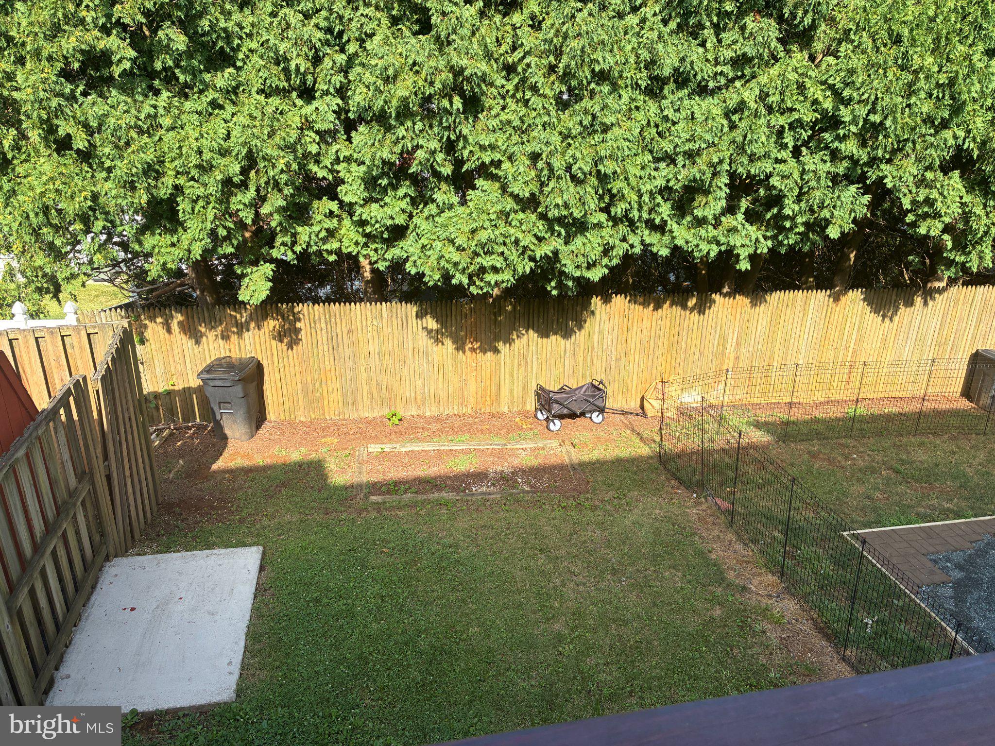 8 Perryfalls Place Nottingham, MD 21236 - Photo 23 of 23 Lush green yard with serene privacy.