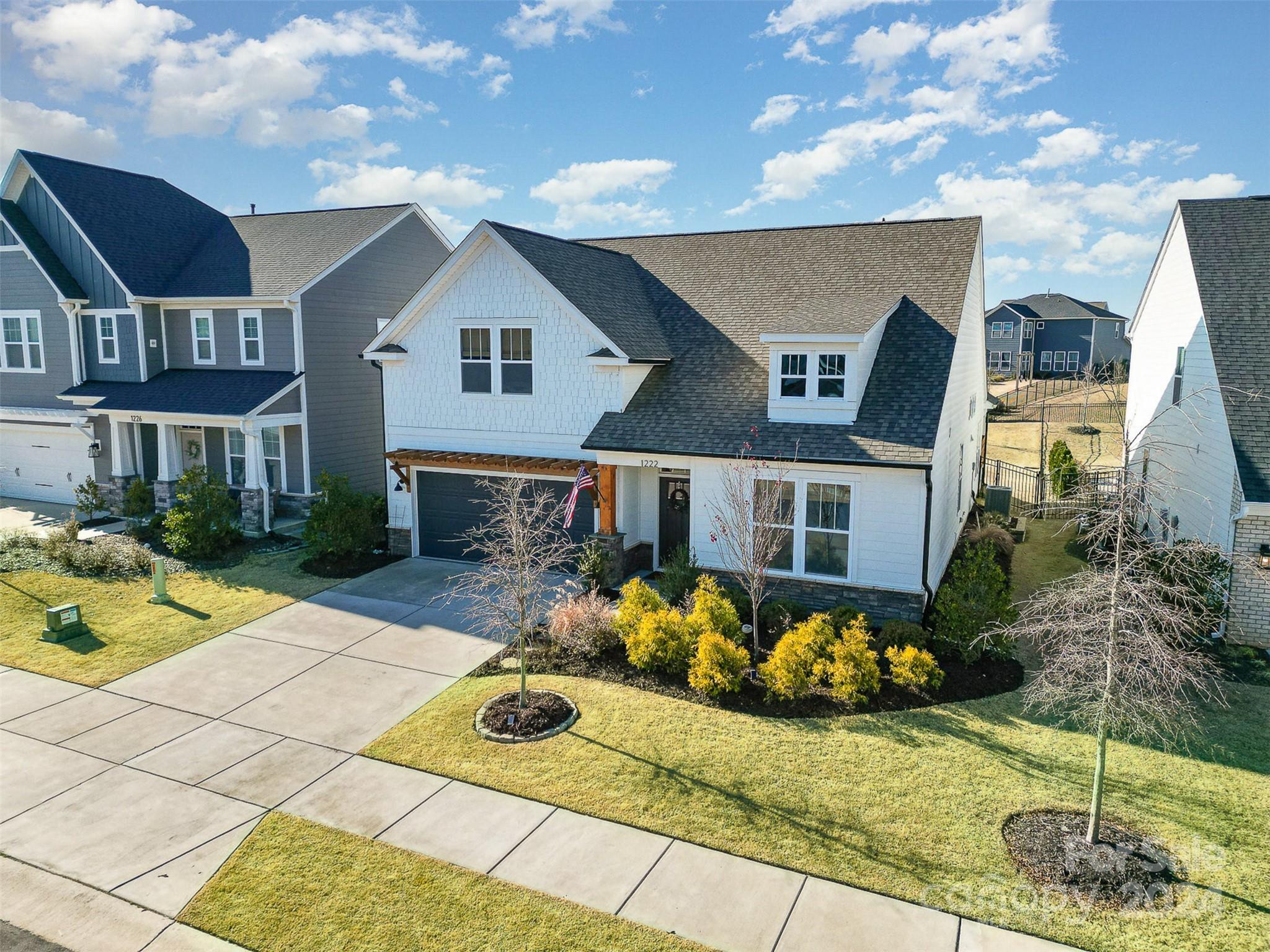 1222 Therns Ferry Drive Fort Mill, SC 29708 - Photo 3 of 35 a front view of a house with garden
