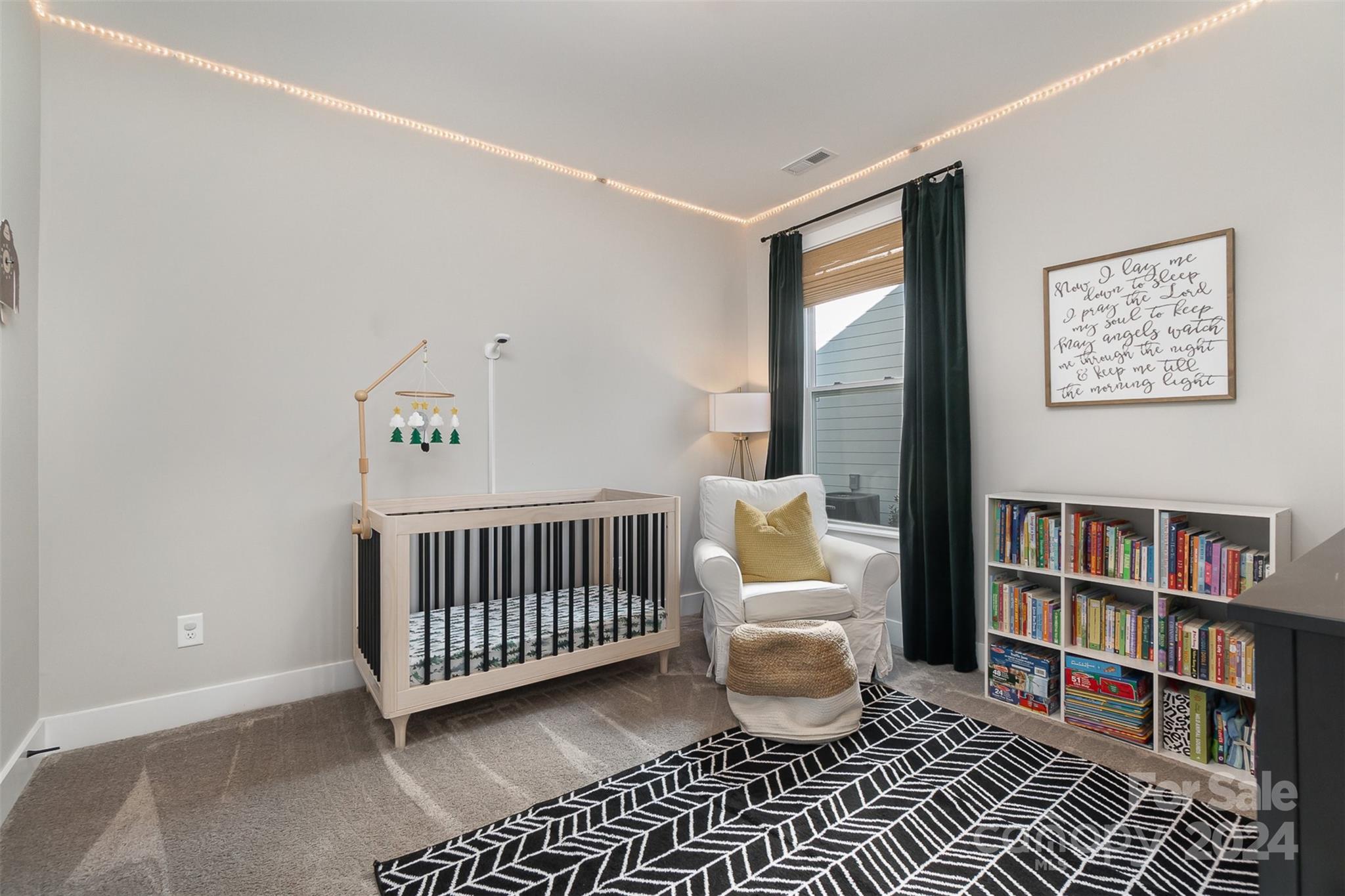 1222 Therns Ferry Drive Fort Mill, SC 29708 - Photo 5 of 35 a bedroom with a bed and book shelf
