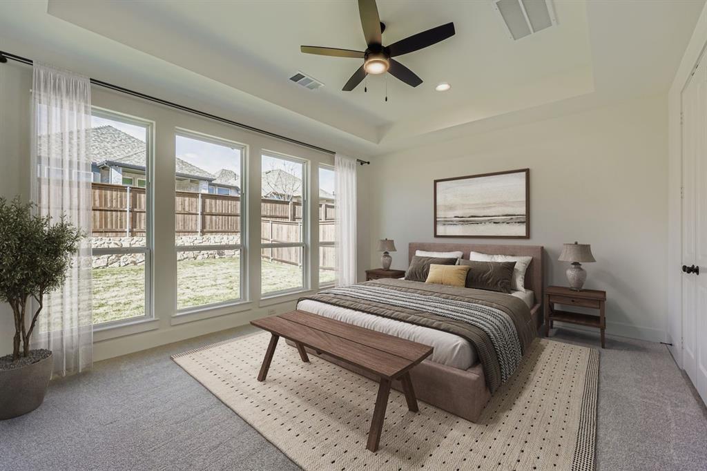 1841 Pk Vista Way Midlothian, TX 76065 - Photo 10 of 28 a bedroom with a bed a couch and a large window