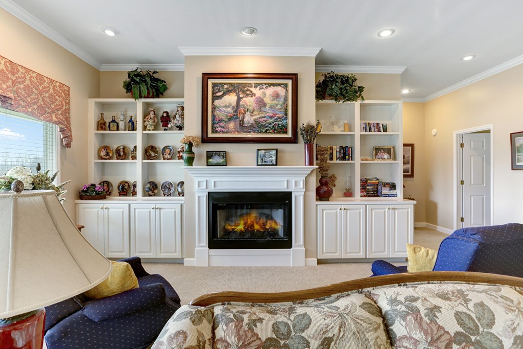 18 Foxfire Court Hayesville, NC 28904 - Photo 13 of 41 a bed room with furniture and a fireplace