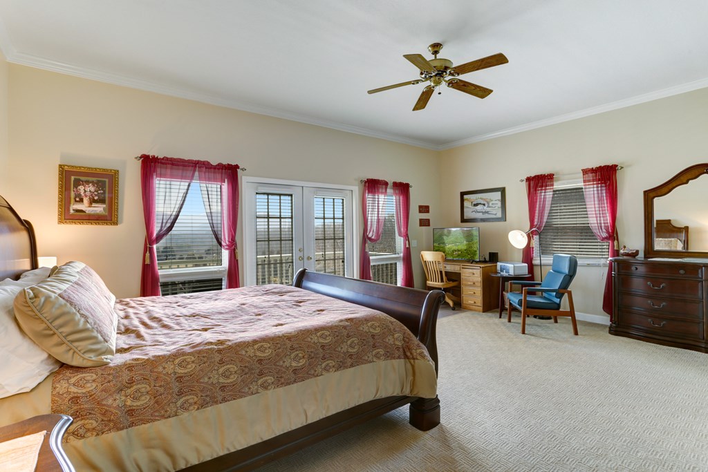 18 Foxfire Court Hayesville, NC 28904 - Photo 16 of 41 a bedroom with a bed and a couch