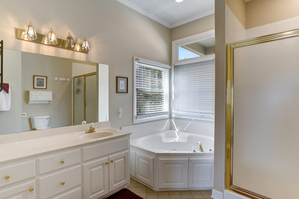 18 Foxfire Court Hayesville, NC 28904 - Photo 17 of 41 a bathroom with a sink and a mirror