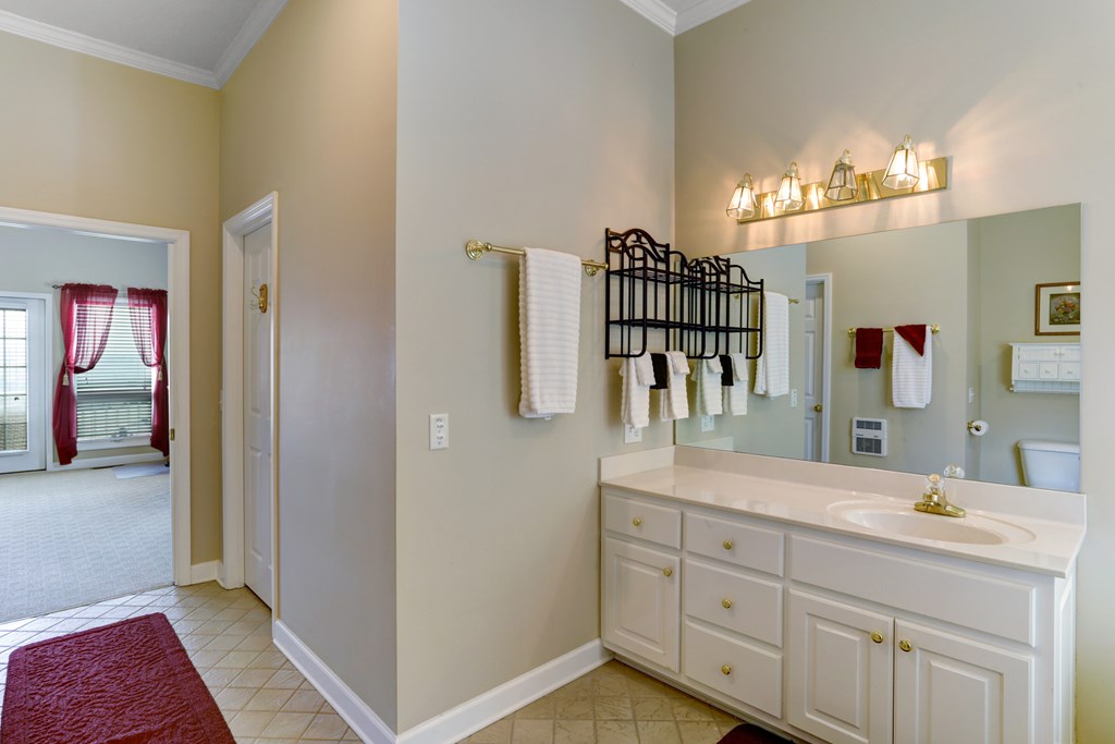 18 Foxfire Court Hayesville, NC 28904 - Photo 18 of 41 a bathroom with a sink and a mirror
