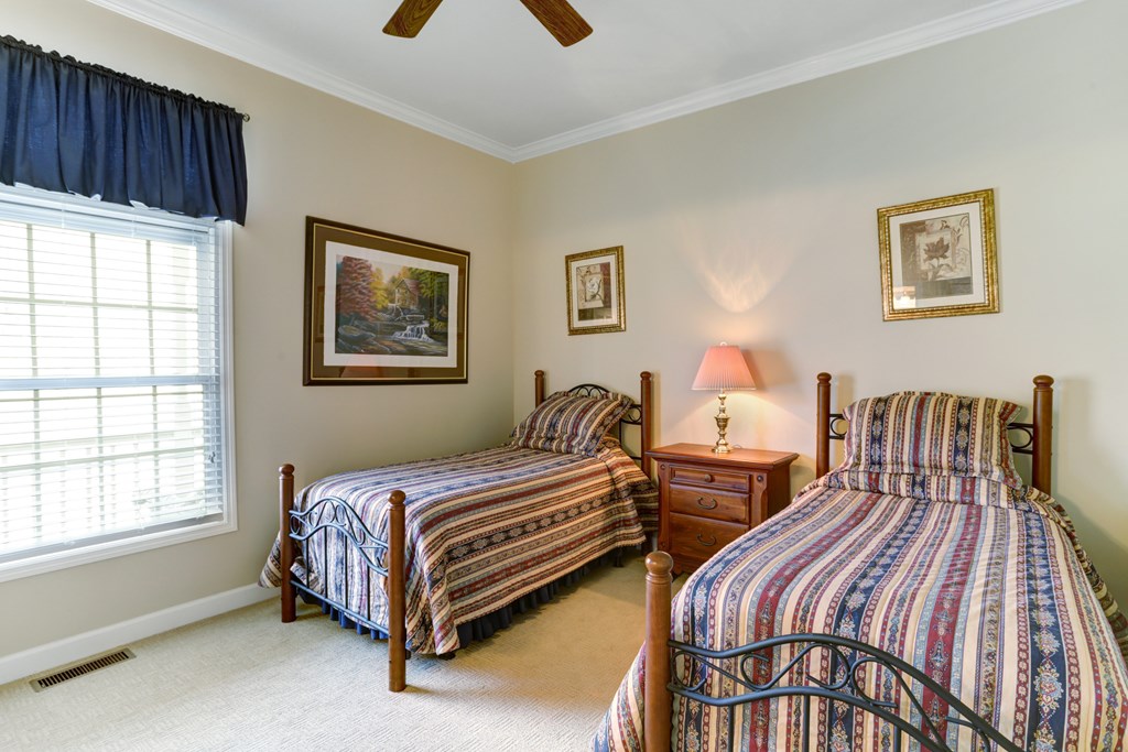 18 Foxfire Court Hayesville, NC 28904 - Photo 19 of 41 a bedroom with two beds and a window