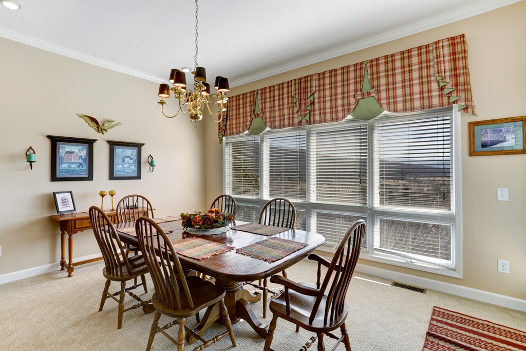 18 Foxfire Court Hayesville, NC 28904 - Photo 21 of 41 a view of a dining room with furniture and window